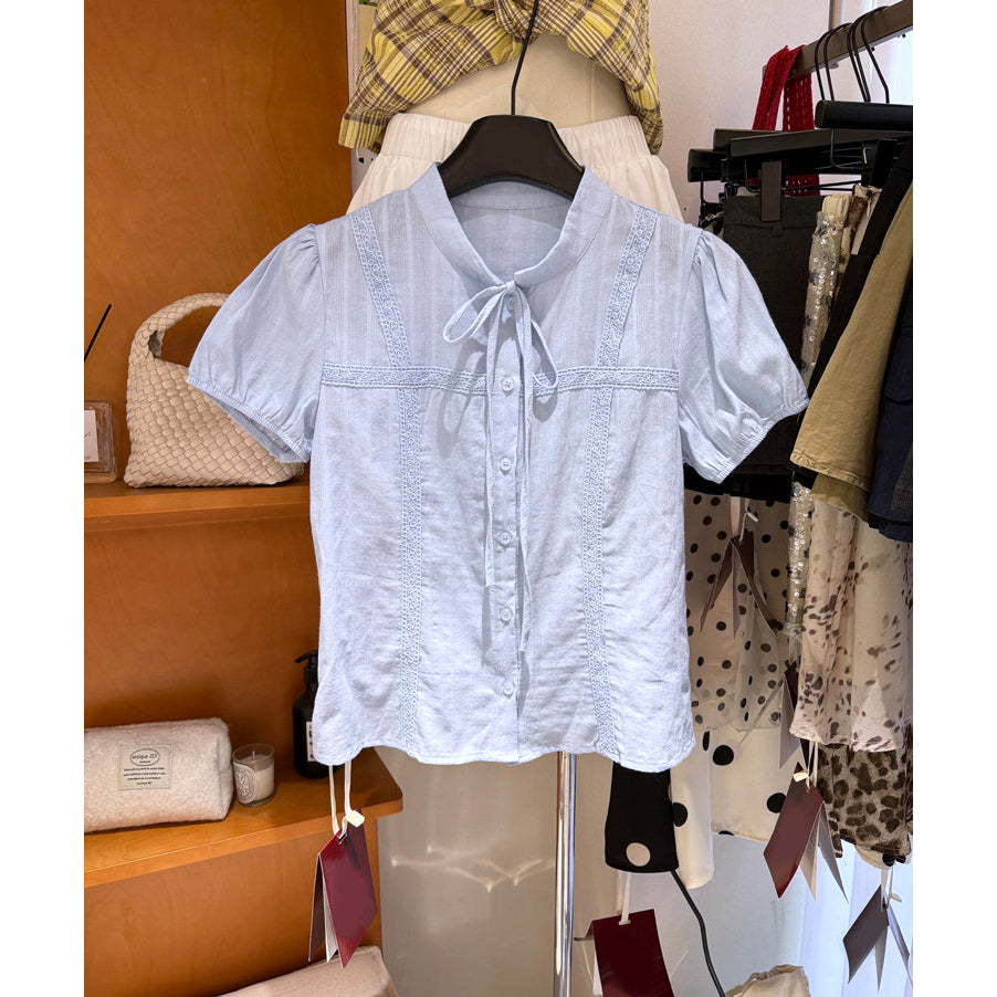 Women's blue lace trim tie neck puff sleeve button front blouse