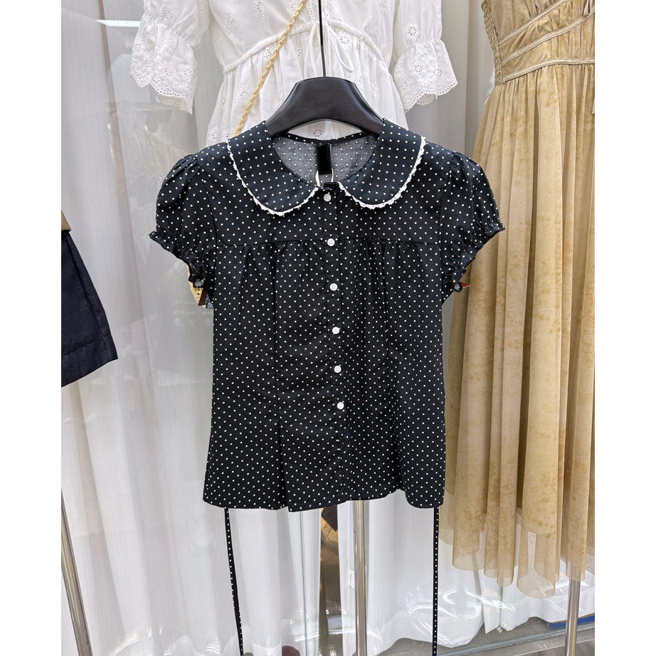 Women's black polka dot Peter Pan collar puff sleeve blouse with tie back waist